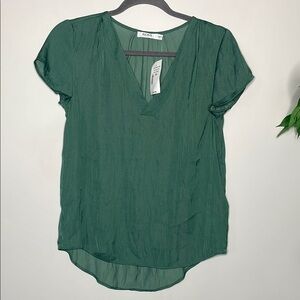Ricki’s Green Flutter Sleeve Blouse